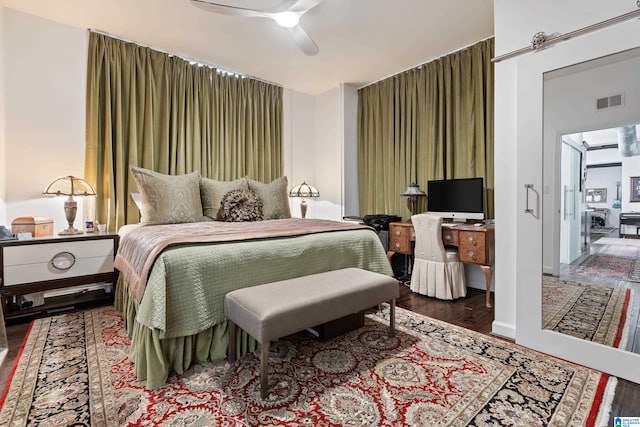 2201 1st Ave N Unit 300-C, Birmingham, AL 35203 - bedroom with wood finished floors and ceiling fan