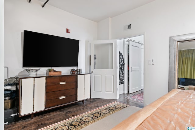 2201 1st Ave N Unit 300-C, Birmingham, AL 35203 - bedroom with dark wood-style floors