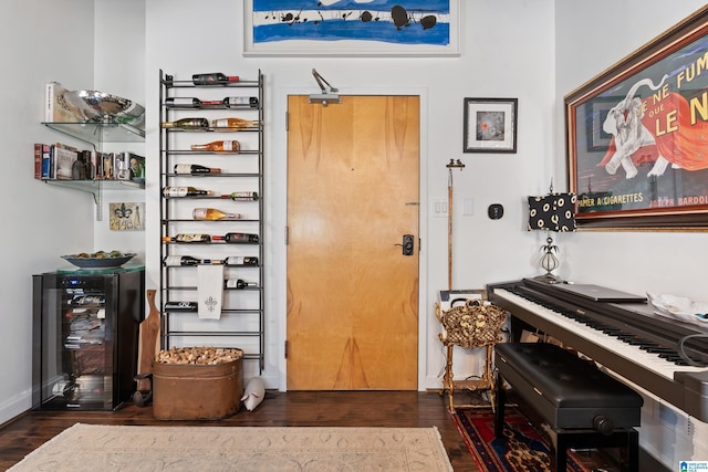 2201 1st Ave N Unit 300-C, Birmingham, AL 35203 - foyer featuring beverage cooler, dark wood-style floors, and baseboards