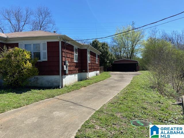 2005 49th St W, Birmingham, AL 35208 - view of side of home featuring an outdoor structure