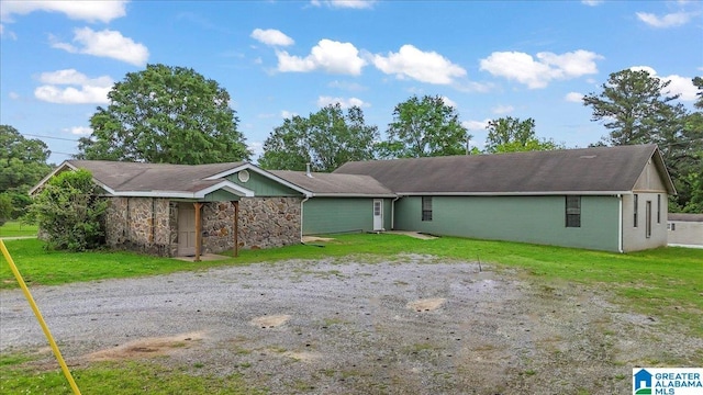 117 Trafford Rd, Warrior, AL 35180 - view of front facade featuring a front yard and stone siding