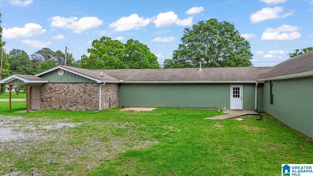 117 Trafford Rd, Warrior, AL 35180 - view of home's exterior featuring a yard and stone siding