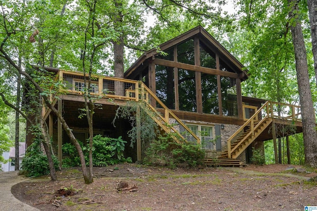 3321 Shetland Trce, Birmingham, AL 35242 - rear view of property with stairs, a deck, and brick siding