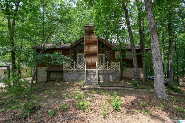 3321 Shetland Trce, Birmingham, AL 35242 - rear view of property featuring a chimney and a wooden deck