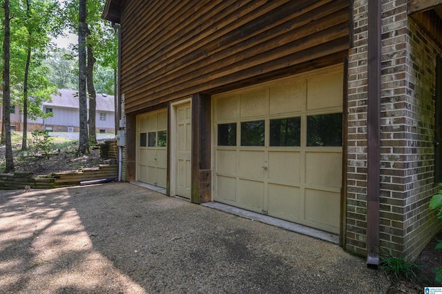 3321 Shetland Trce, Birmingham, AL 35242 - garage featuring asphalt driveway