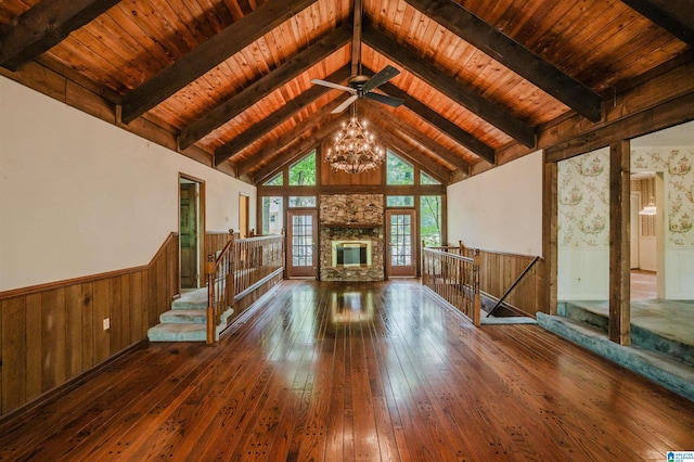 3321 Shetland Trce, Birmingham, AL 35242 - unfurnished living room with a wainscoted wall, hardwood / wood-style floors, a chandelier, high vaulted ceiling, and wood ceiling with exposed beams