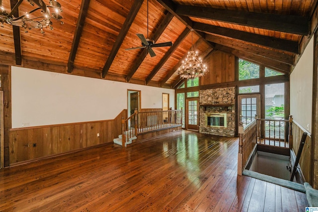 3321 Shetland Trce, Birmingham, AL 35242 - unfurnished living room featuring a chandelier, wood-type flooring, wood ceiling with exposed beams, high vaulted ceiling, and wood walls