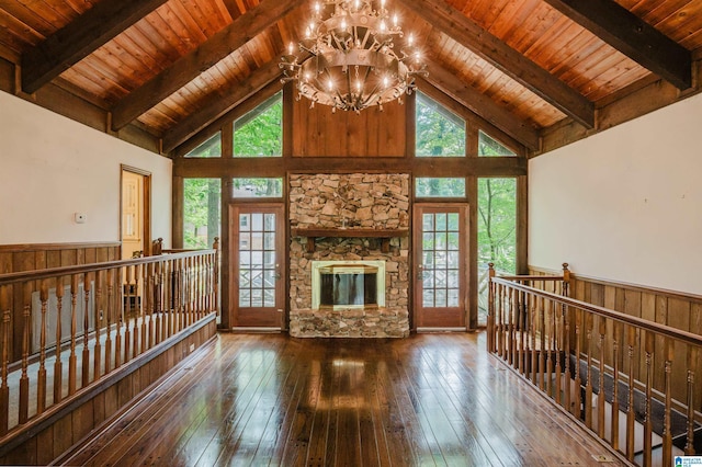 3321 Shetland Trce, Birmingham, AL 35242 - unfurnished living room with a chandelier, wainscoting, high vaulted ceiling, wood-type flooring, and wooden ceiling with exposed beams