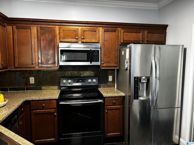 312 Riverhaven Pl Unit 312, Hoover, AL 35244 - kitchen featuring stainless steel appliances, tasteful backsplash, ornamental molding, and light stone counters
