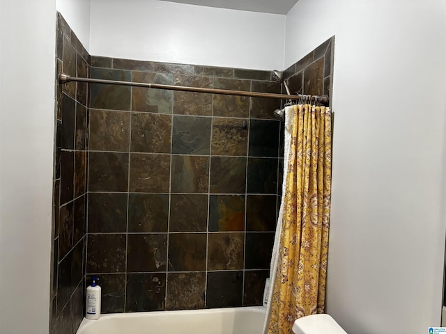 312 Riverhaven Pl Unit 312, Hoover, AL 35244 - bathroom featuring shower / bath combo with shower curtain and toilet