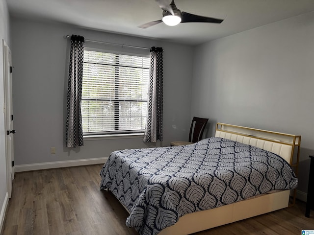 312 Riverhaven Pl Unit 312, Hoover, AL 35244 - bedroom featuring wood finished floors, baseboards, and a ceiling fan