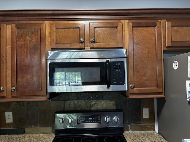 312 Riverhaven Pl Unit 312, Hoover, AL 35244 - kitchen view of stainless steel appliances and backsplash