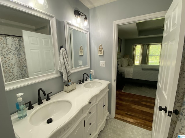 13634 Lisa Dr, Lake View, AL 35111 - full bathroom with double vanity and ensuite bath