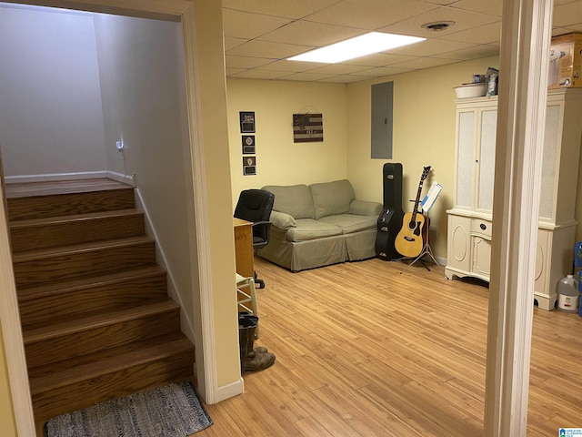 13634 Lisa Dr, Lake View, AL 35111 - living area with electric panel, stairs, and light wood-style floors