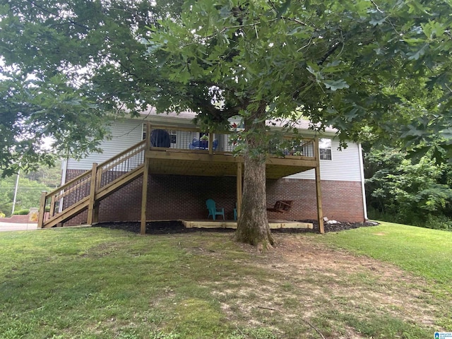 13634 Lisa Dr, Lake View, AL 35111 - rear view of house with a yard, stairs, a deck, and brick siding