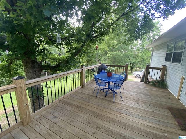 13634 Lisa Dr, Lake View, AL 35111 - wooden terrace with outdoor dining area