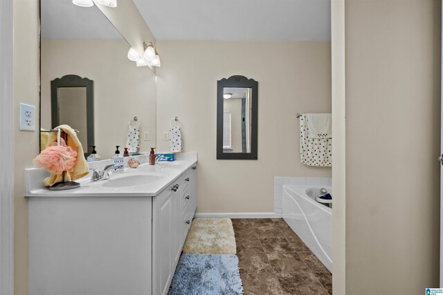 347 Forest Lakes Dr, Sterrett, AL 35147 - full bathroom with vanity, baseboards, and a bath