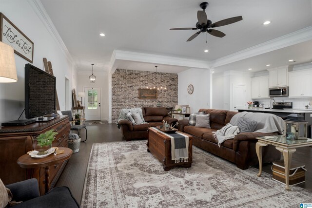 13129 Fondren Rd, Northport, AL 35475 - living area with wood finished floors, ceiling fan, crown molding, and recessed lighting