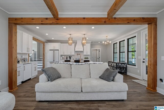 1165 Cedar Creek Dr, Sylacauga, AL 35151 - living area featuring recessed lighting, dark wood-style floors, a chandelier, baseboards, and crown molding