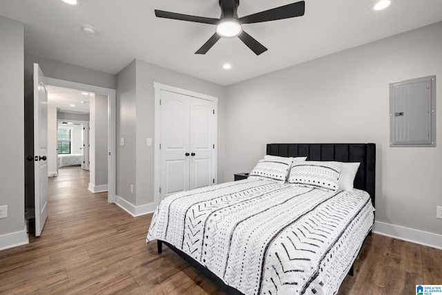 1165 Cedar Creek Dr, Sylacauga, AL 35151 - bedroom with electric panel, wood finished floors, baseboards, recessed lighting, and a closet