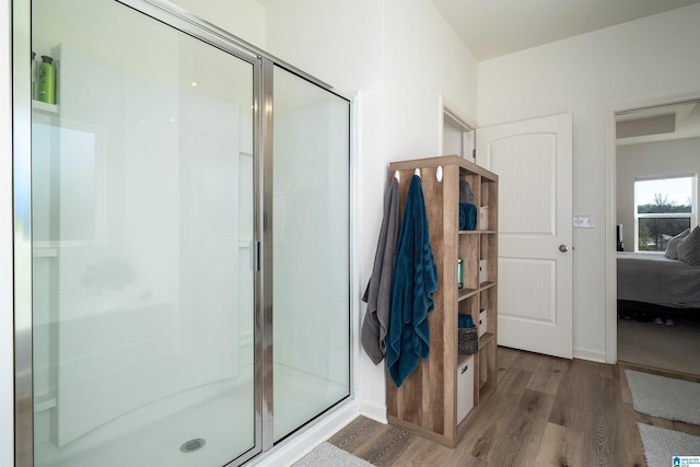 154 Halifax Ln, Chelsea, AL 35043 - ensuite bathroom with wood finished floors, a stall shower, and baseboards