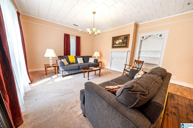 580 3rd St SW, Ashland, AL 36251 - living area with a chandelier, ornamental molding, baseboards, and carpet floors