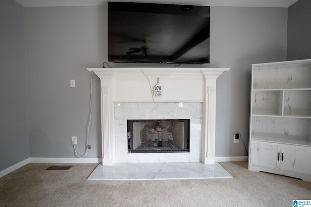 13339 Sylvia Dr, Lake View, AL 35111 - detailed view of carpet floors, a high end fireplace, ceiling fan, and baseboards
