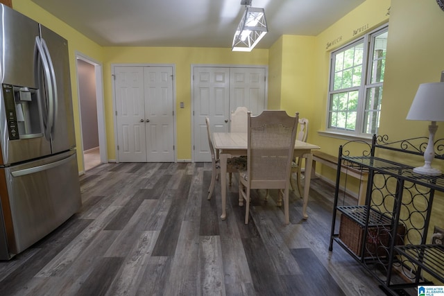 13339 Sylvia Dr, Lake View, AL 35111 - dining area featuring dark wood-style flooring and baseboards