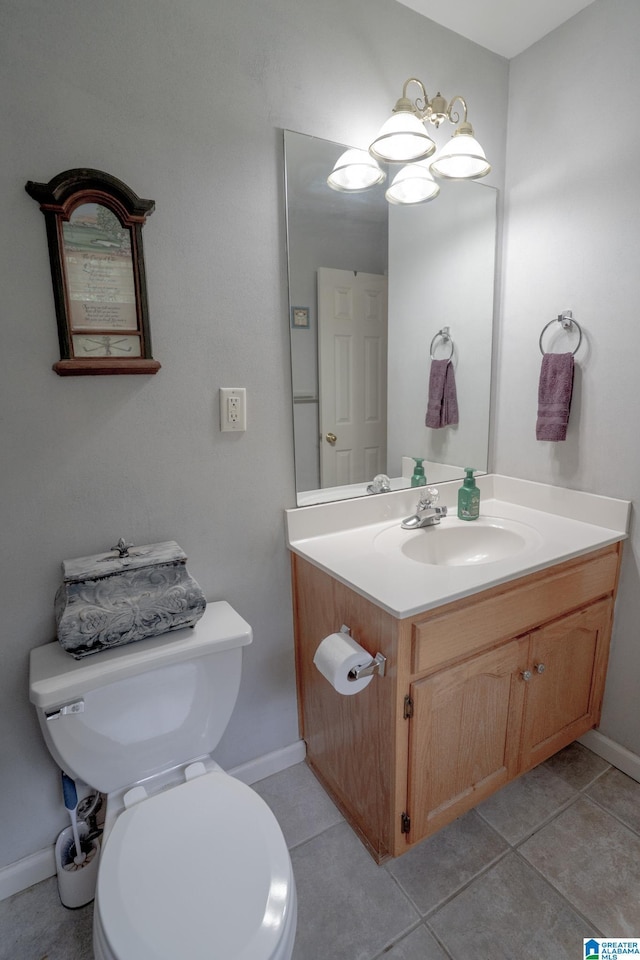 13339 Sylvia Dr, Lake View, AL 35111 - bathroom featuring vanity, toilet, tile patterned flooring, and baseboards