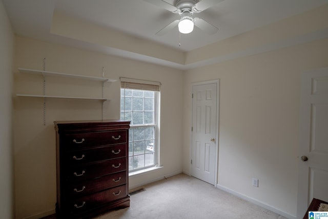 13339 Sylvia Dr, Lake View, AL 35111 - unfurnished bedroom with light carpet, baseboards, a tray ceiling, and ceiling fan