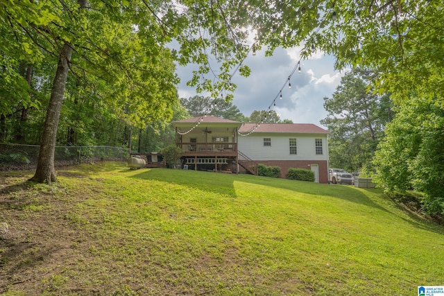13339 Sylvia Dr, Lake View, AL 35111 - rear view of house featuring ceiling fan, stairs, and a wooden deck