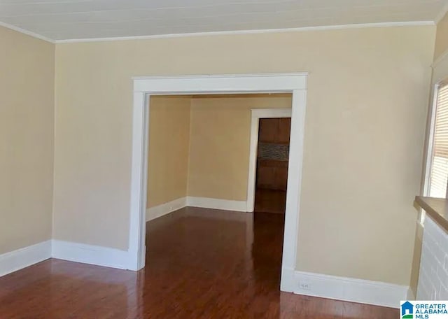 8405 3rd Ave S, Birmingham, AL 35206 - empty room featuring ornamental molding, wood finished floors, and baseboards