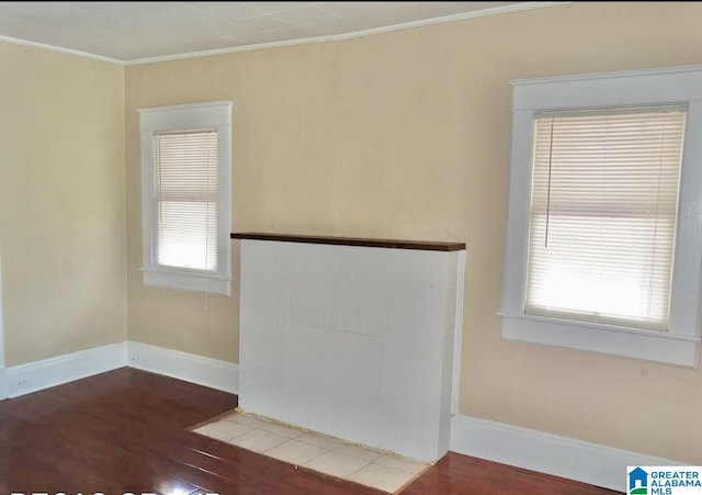 8405 3rd Ave S, Birmingham, AL 35206 - unfurnished room featuring wood finished floors, ornamental molding, and baseboards