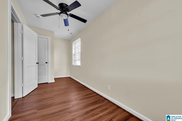 741 Center Pl SW, Birmingham, AL 35211 - unfurnished bedroom featuring wood finished floors and ceiling fan