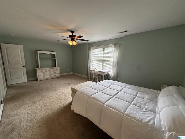 21131 Delmar Dr, Lake View, AL 35111 - carpeted bedroom with baseboards and ceiling fan