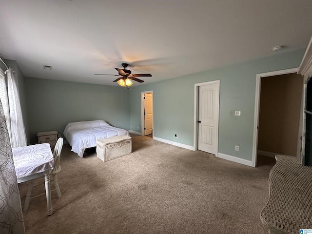 21131 Delmar Dr, Lake View, AL 35111 - carpeted bedroom with baseboards and a ceiling fan