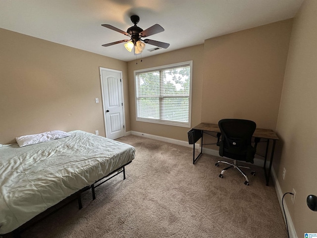 21131 Delmar Dr, Lake View, AL 35111 - bedroom featuring light colored carpet and a ceiling fan