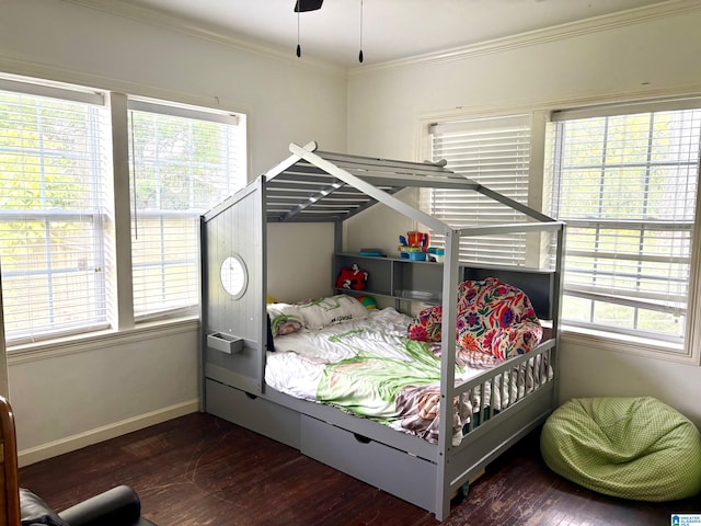 1005 4th Ave N, Clanton, AL 35045 - bedroom featuring multiple windows, wood-type flooring, ornamental molding, and baseboards