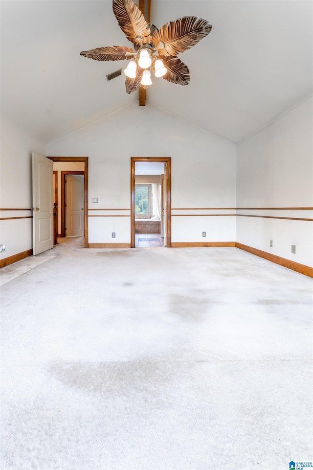 1709 Round Hill Rd, Weaver, AL 36277 - empty room featuring baseboards, ceiling fan, carpet flooring, and vaulted ceiling