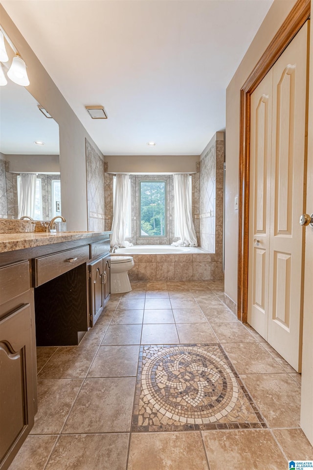 1709 Round Hill Rd, Weaver, AL 36277 - full bath featuring vanity, toilet, a tub, and recessed lighting
