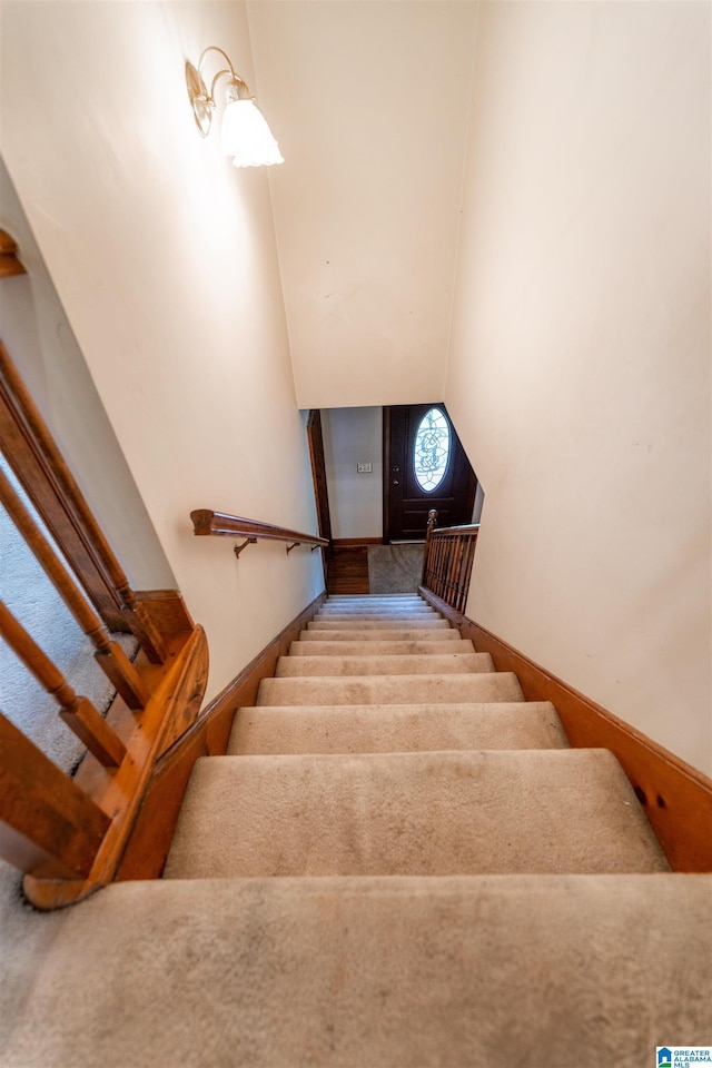 1709 Round Hill Rd, Weaver, AL 36277 - stairway featuring carpet floors and baseboards