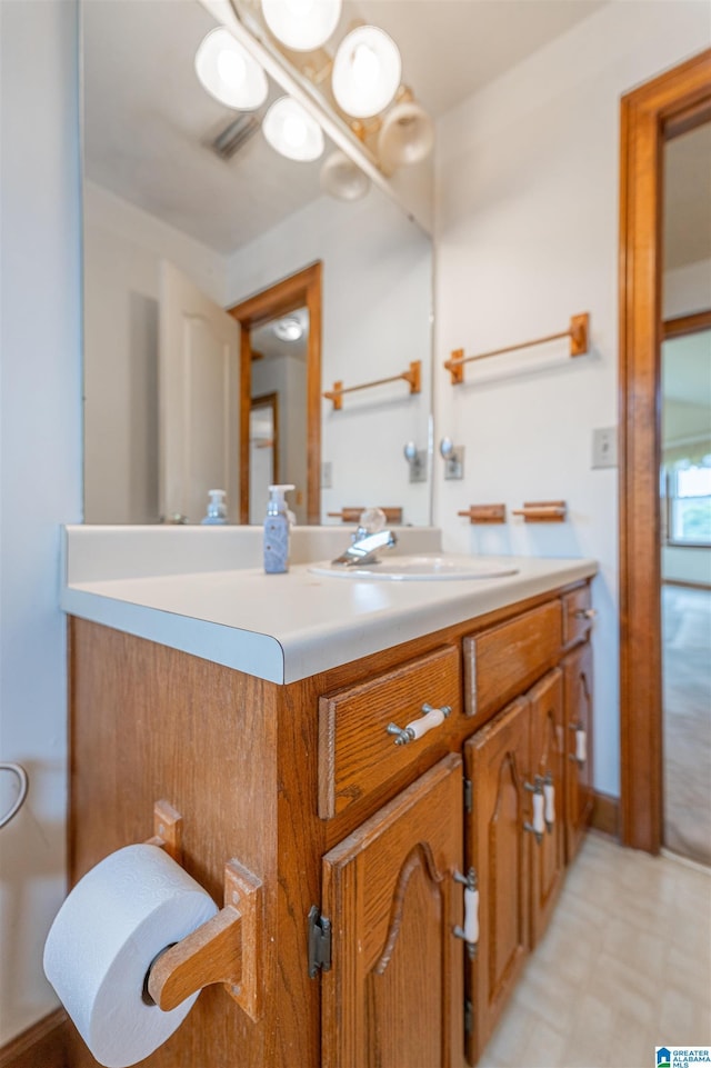 1709 Round Hill Rd, Weaver, AL 36277 - bathroom with vanity and tile patterned floors