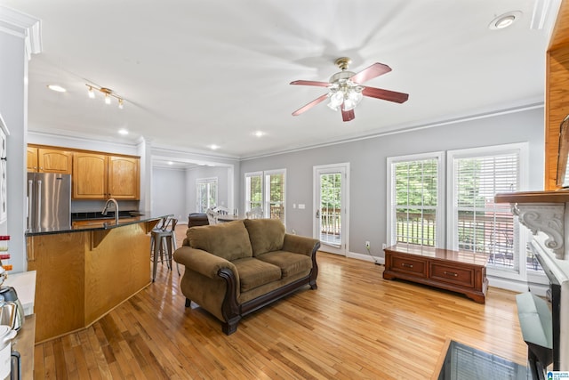 691 Reid Dr, Trafford, AL 35172 - living area with crown molding, ceiling fan, light wood-style floors, baseboards, and recessed lighting
