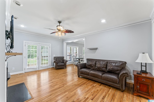 691 Reid Dr, Trafford, AL 35172 - living room with light wood finished floors, ceiling fan, crown molding, baseboards, and recessed lighting