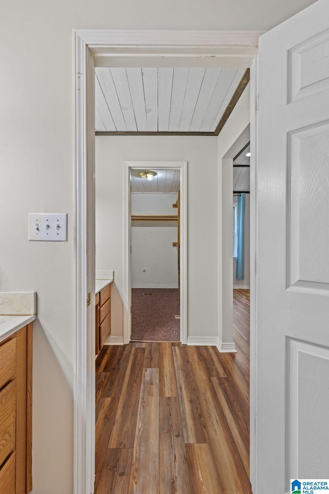 159 Williams Rd, Cullman, AL 35057 - hall featuring dark wood-style flooring, baseboards, and wooden ceiling