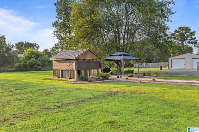 159 Williams Rd, Cullman, AL 35057 - view of green lawn featuring an outdoor structure, a gazebo, and a detached garage