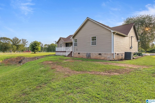 159 Williams Rd, Cullman, AL 35057 - rear view of house with crawl space, central AC, and a yard