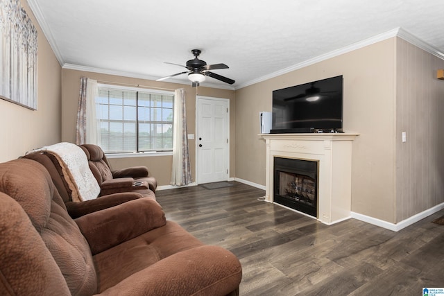 4507 Charles Ave, Anniston, AL 36206 - living area with a ceiling fan, wood finished floors, a fireplace, baseboards, and crown molding