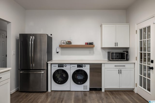 5883 William O Ln, Gardendale, AL 35071 - washroom featuring separate washer and dryer and dark wood-type flooring