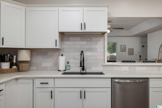 5883 William O Ln, Gardendale, AL 35071 - kitchen with dishwasher, a sink, white cabinets, and backsplash